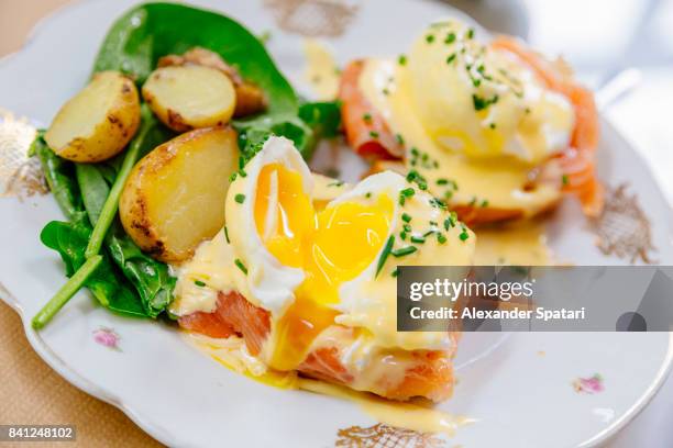 eggs benedict close up, high angle view - eggs-benedict stock pictures, royalty-free photos & images