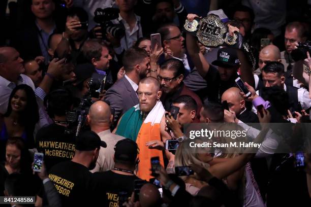 Conor McGregor walks to the ring prior to his super welterweight boxing match against Floyd Mayweather Jr. On August 26, 2017 at T-Mobile Arena in...