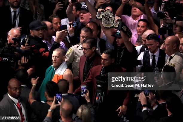 Conor McGregor walks to the ring prior to his super welterweight boxing match against Floyd Mayweather Jr. On August 26, 2017 at T-Mobile Arena in...