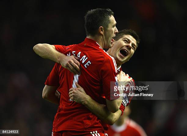 Robbie Keane of Liverpool is congratulated by team mate Steven Gerrard after scoring his team's second goal during the Barclays Premier League match...