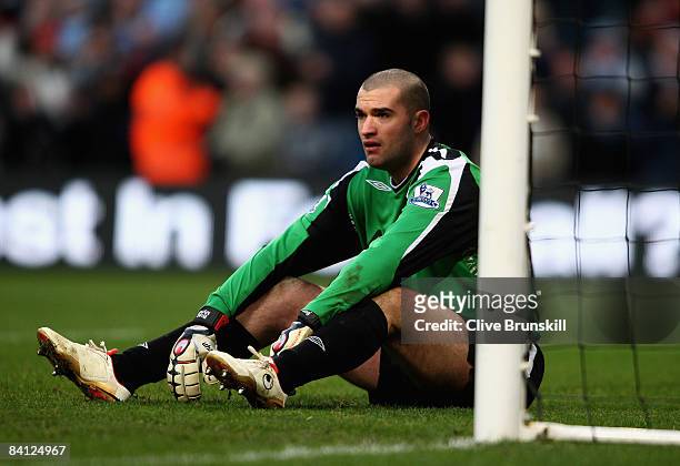 Hull City keeper Boaz Myhill shows his dejection after the fourth goal during the Barclays Premier League match between Manchester City and Hull City...
