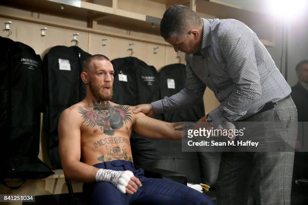 Conor McGregor warms up in his locker room prior to his super welterweight boxing match against Floyd Mayweather Jr. On August 26, 2017 at T-Mobile...