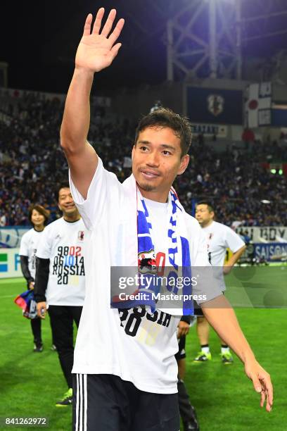 Yuto Nagatomo of Japan applauds supporters after his team's 2-0 victory and qualified for the FIFA World Cup Russia after the FIFA World Cup...