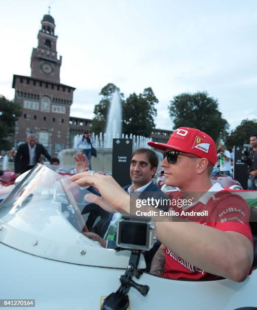 Kimi Raikkonen of Finland and Ferrari on the drivers parade at Castello Sforzesco on August 31, 2017 in Milan, Italy.