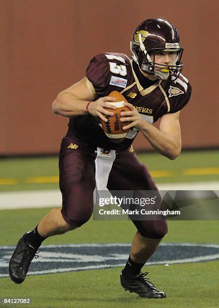 Dan LeFevour of the Central Michigan Chippewas looks to throw a pass against the Florida Atlantic University Owls during the 2008 Motor City Bowl at...