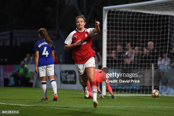 Jodie Taylor celebrates scoring Arsenal's 1st goal during the match between Arsenal Women and Everton Ladies at Meadow Park on August 31, 2017 in...