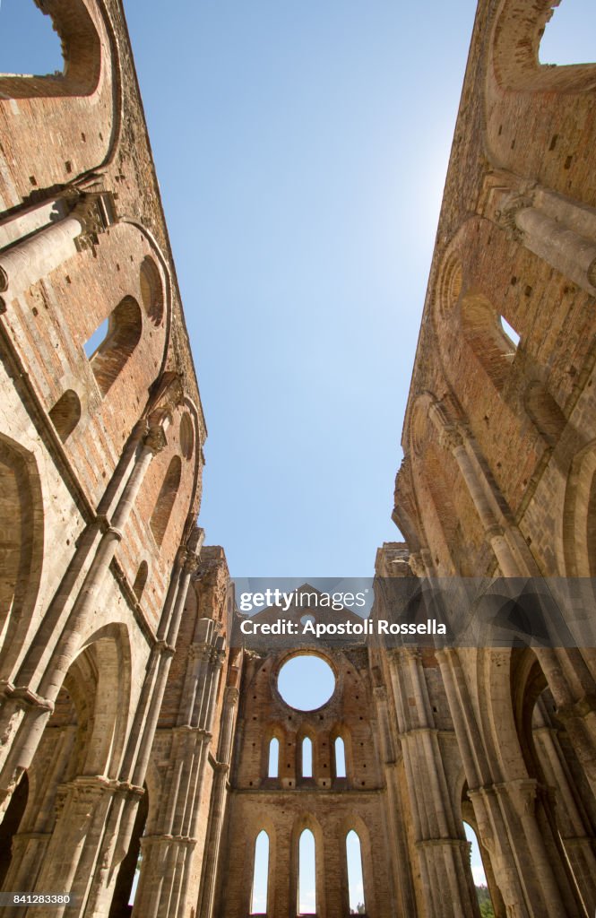 Indoor view of old roofless abandoned cathedral in San Galgano. Tuscany,