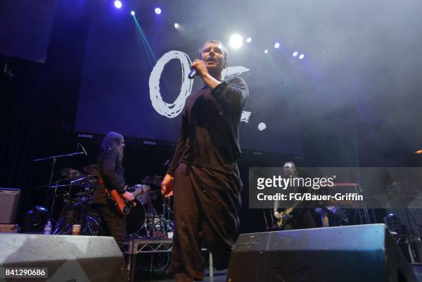 Singer Svatoslav Vakarachuk, Vladimir Opsenica and Denis Dudko of the band Okean Enzy performs at the Avalon, Hollywood on March 13, 2017 in Los...
