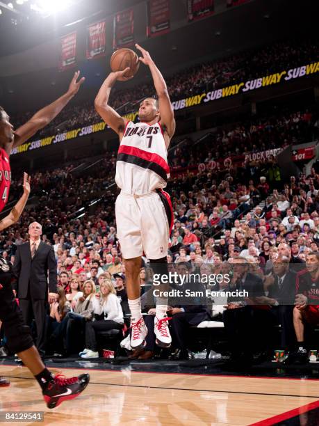 Brandon Roy of the Portland Trail Blazers goes up for a shot over Chris Bosh of the Toronto Raptors during a game on December 27, 2008 at the Rose...