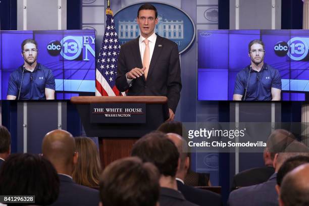 White House Homeland Security Advisor Tom Bossert answers a question from a reporter in Texas via Skype during a news conference in the Brady Press...