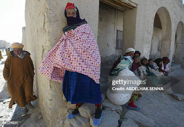 Abdelfettah FAKIHANI Residents of the village of Imilchil, a village situated at 2200m altitude at the heart of the High Atlas, sit in the shade on...