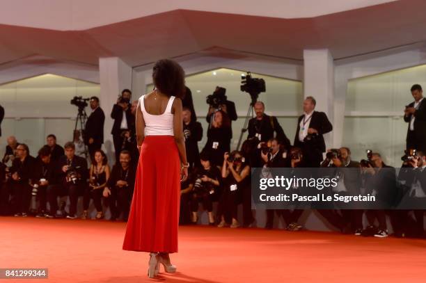 Yusra Warsama from the movie 'L'Ordine Delle Cose' walk the red carpet ahead of the 'The Insult' screening during the 74th Venice Film Festival at...