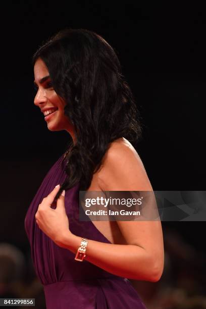 Actress Rita Hayek wearing a Jaeger-LeCoultre Reverso One Duetto Moon watch attends the 'The Insult' premiere during the 74th Venice Film Festival at...