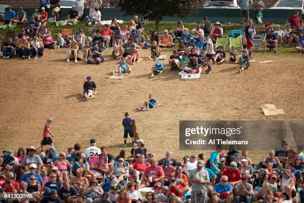 Little League World Series: Fans and kids sliding down Lamade hill using flattened cardboard during Championship Game between USA Southwest Region vs...