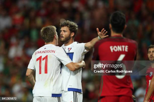 Faroe Island defender Rogvi Baldvinsson celebrates scoring Faroe Island with Faroe Island midfielder Joan Edmundsson during the match between...