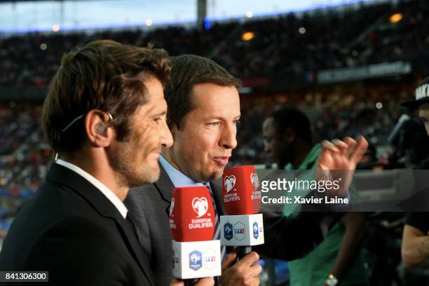 French presentator of chanel TF1, Bixente Lizzarazu and Gregoire Margotton during the FIFA 2018 World Cup Qualifier between France and Netherlands at...