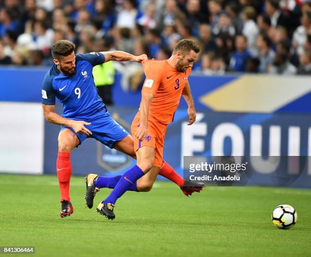 Olivier Giroud of France in action against Stefan de Vrij of Netherlands during the FIFA World Cup 2018 qualifying Group A match between France and...