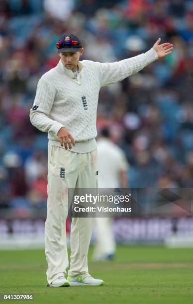 England captain Joe Root organises his fielders during the fifth day of the second test between England and West Indies at Headingley on August 29,...