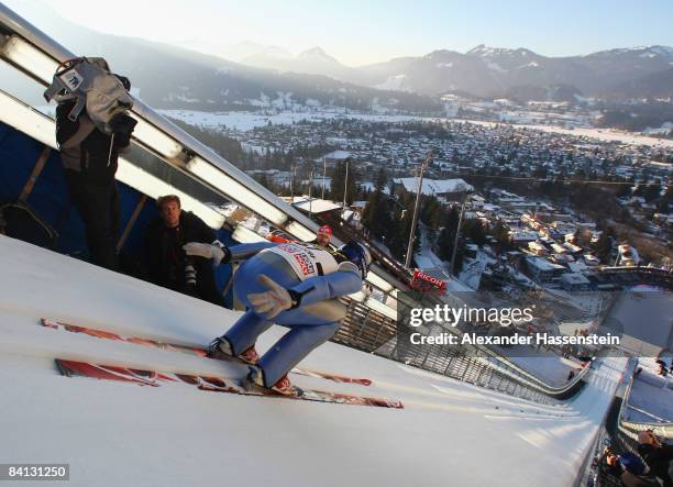 Thomas Morgenstern of Austria in action during the training round of the FIS Ski Jumping World Cup at the 57th Four Hills Skijumping Tournament on...