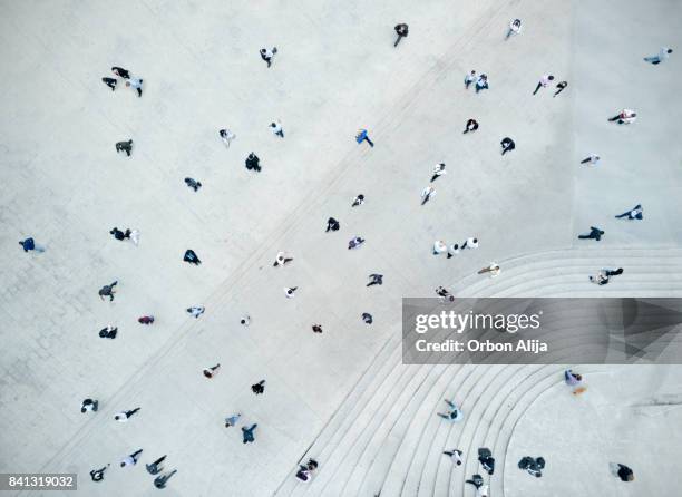 high angle view of people on street - menschenmenge von oben stock-fotos und bilder