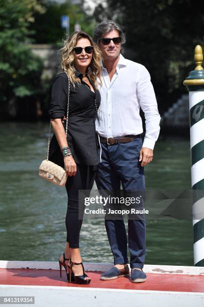 Daniela Santanche and Dimitri D'Asburgo are seen during the 74. Venice Film Festival on August 31, 2017 in Venice, Italy.