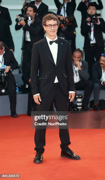 Francesco Patierno walks the red carpet ahead of the 'The Shape Of Water' screening during the 74th Venice Film Festival in Venice, Italy, on August...