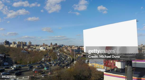 aerial view of a blank highway sign and crowded highway - billboards 2017 stock pictures, royalty-free photos & images