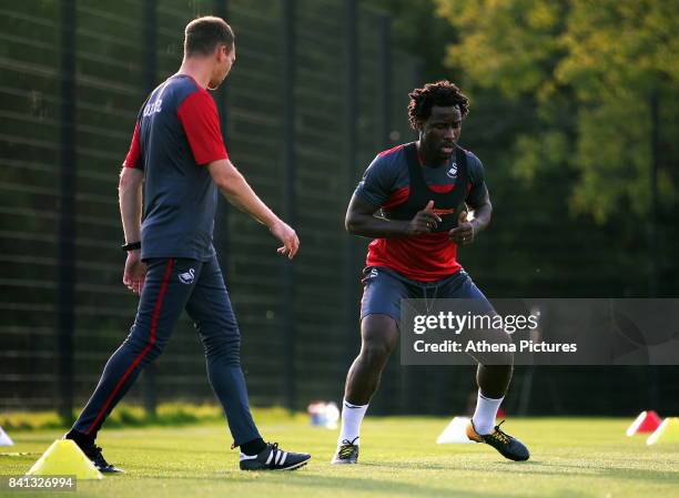 Wilfried Bony goes through his medical with Ritson Lloyd at the Swansea City FC Fairwood Training Ground on August 31, 2017 in Swansea, Wales.