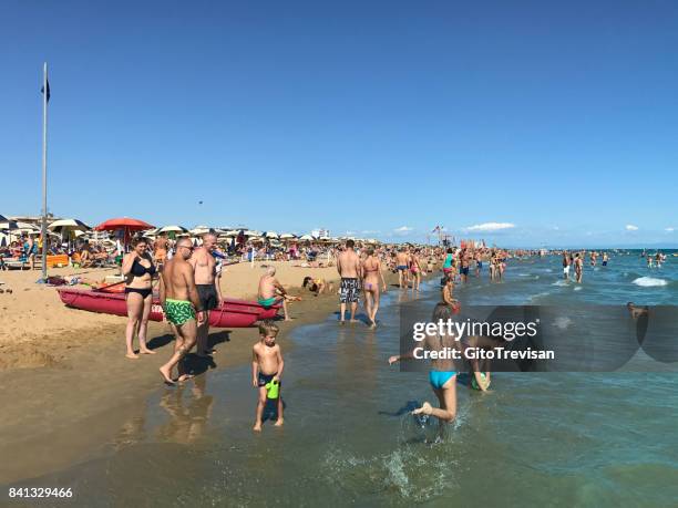 bibione - children play at the sea - bibione stock pictures, royalty-free photos & images