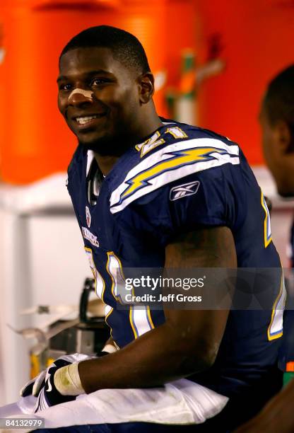 Runningback LaDainian Tomlinson of the San Diego Chargers smiles on the bench during the fourth quarter of the NFL game against the Denver Broncos at...
