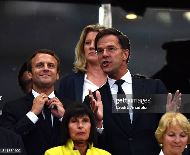 French President Emmanuel Macron and Dutch Prime Minister Mark Rutte attend the FIFA World Cup 2018 qualifying Group A match between France and...