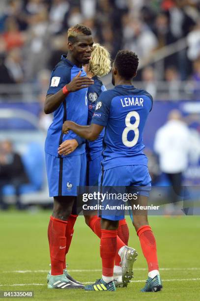 Paul Pogba of France congratulates teammate Thomas Lemar after he scored during the FIFA 2018 World Cup Qualifier between France and The Netherlands...