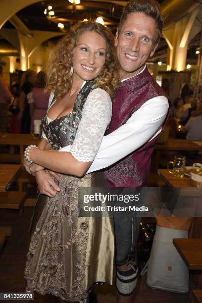 Peer Kusmagk and his girlfriend Janni Hoenscheid during the Angermaier Trachten-Nacht at Hofbraeuhaus on August 31, 2017 in Berlin, Germany.