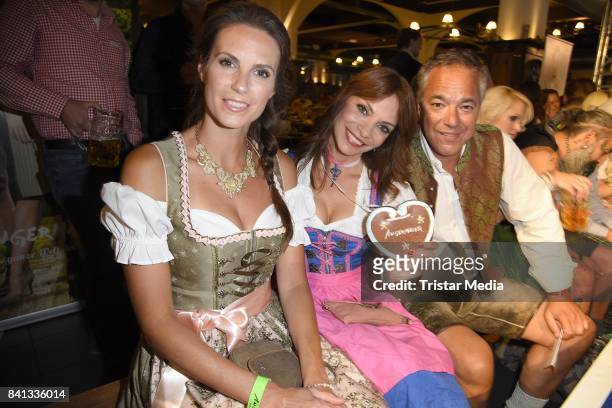Katrin Wrobel, Jean Bork and Charles Rettinghaus during the Angermaier Trachten-Nacht at Hofbraeuhaus on August 31, 2017 in Berlin, Germany.