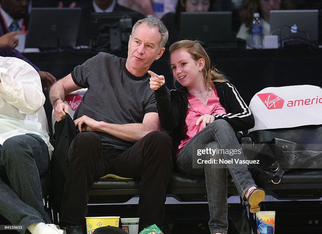 John McEnroe and Ava McEnroe attend the Los Angeles Lakers vs Golden... News Photo - Getty Images
