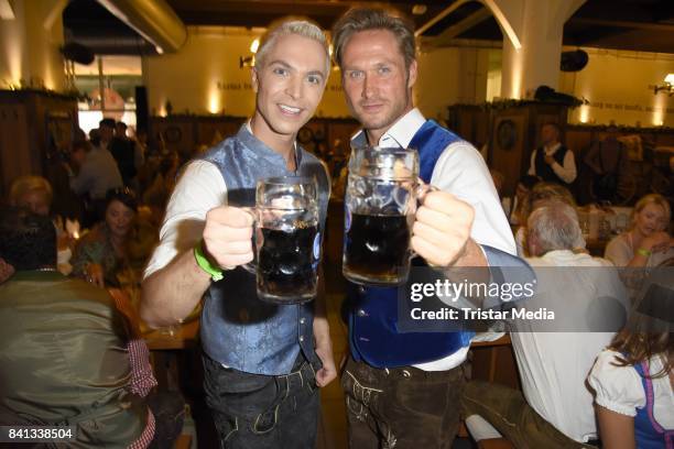 Julian David and Nico Schwanz during the Angermaier Trachten-Nacht at Hofbraeuhaus on August 31, 2017 in Berlin, Germany.