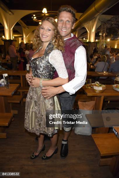 Peer Kusmagk and his girlfriend Janni Hoenscheid during the Angermaier Trachten-Nacht at Hofbraeuhaus on August 31, 2017 in Berlin, Germany.