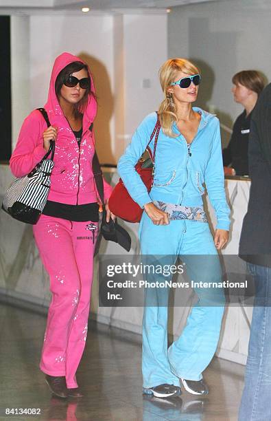 Paris Hilton and Brittany Flickinger arrive at Melbourne International Airport on December 29, 2008 in Melbourne, Australia.