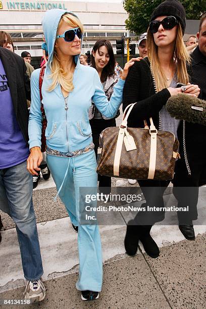 Paris Hilton and sister Nicky Hilton arrive at Melbourne International Airport on December 29, 2008 in Melbourne, Australia.