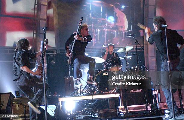 Dave Grohl, Tony Kanal, Pete Thomas and Bruce Springsteen perform "London Calling" in tribute to the late Joe Strummer