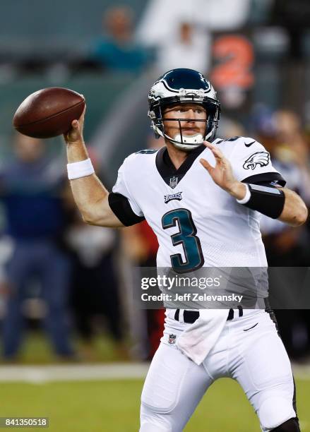 Matt McGloin of the Philadelphia Eagles looks to pass against the New York Jets during their preseason game at MetLife Stadium on August 31, 2017 in...