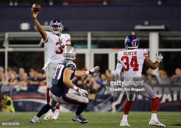 Geno Smith of the New York Giants throws to Shane Vereen during a preseason game with the New England Patriots at Gillette Stadium on August 31, 2017...
