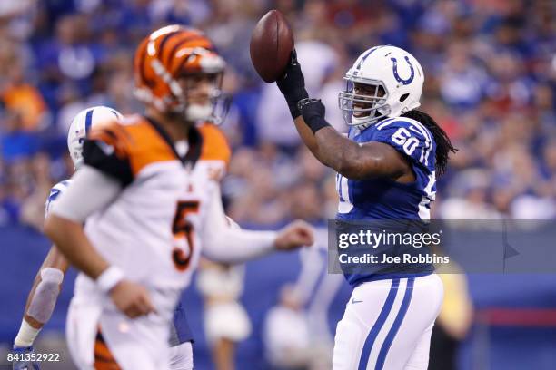 Josh Boyd of the Indianapolis Colts celebrates after recovering a fumble in the first half of a preseason game against the Cincinnati Bengals at...