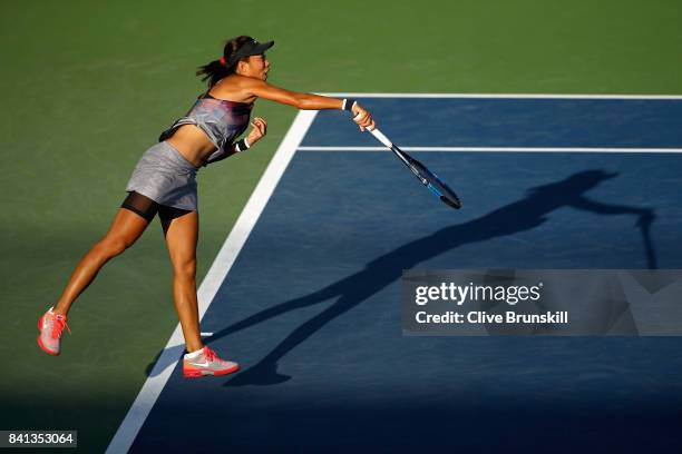 Risa Ozaki of Japan serves against Saisai Zheng of China on Day Four of the 2017 US Open at the USTA Billie Jean King National Tennis Center on...