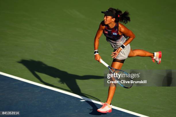 Risa Ozaki of Japan serves against Saisai Zheng of China on Day Four of the 2017 US Open at the USTA Billie Jean King National Tennis Center on...