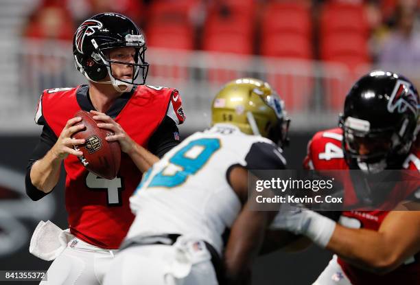 Matt Simms of the Atlanta Falcons looks to pass against the Jacksonville Jaguars at Mercedes-Benz Stadium on August 31, 2017 in Atlanta, Georgia.