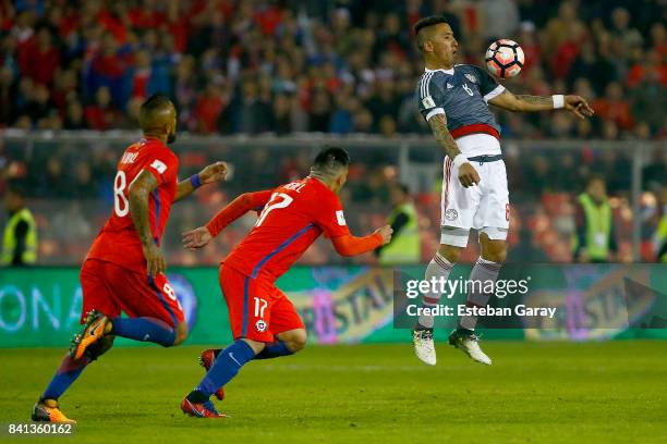 Lucas Barrios of Paraguay controls the ball during a match between Chile and Paraguay as part of FIFA 2018 World Cup Qualifiers at Monumental Stadium...