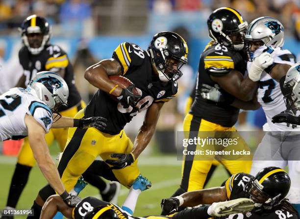 Terrell Watson of the Pittsburgh Steelers runs with the ball against the Carolina Panthers during their game at Bank of America Stadium on August 31,...