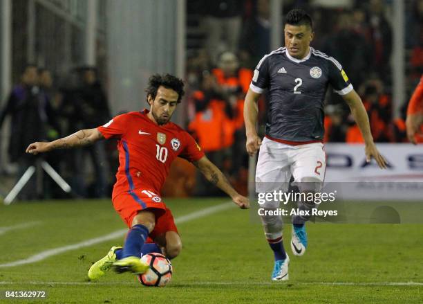 Jorge Valdivia of Chile fights for the ball with Jorge Moreira of Paraguay, during a match between Chile and Paraguay as part of FIFA 2018 World Cup...