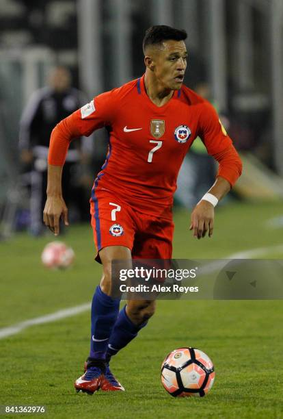 Alexis Sanchez of Chile drives the ball, during a match between Chile and Paraguay as part of FIFA 2018 World Cup Qualifiers at Monumental Stadium on...